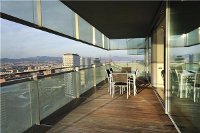 Luxueux appartement avec vue sur les toits de Barcelone